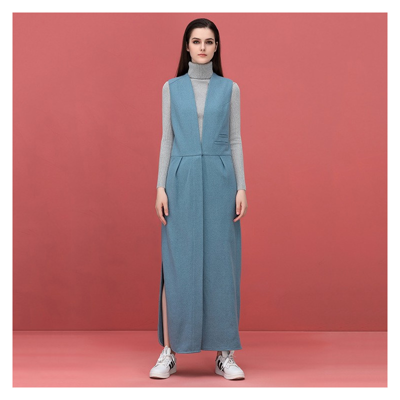 La Personalidad De La Tendencia De La Moda De Largo Chaleco De Punto