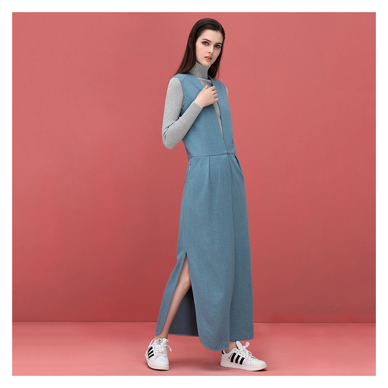 La Personalidad De La Tendencia De La Moda De Largo Chaleco De Punto