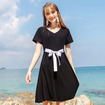 V-Kragen Farbe A Stricken Kleid